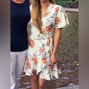 Mini wrap dress purchased from Nordstrom - white with flowers. Worn once!